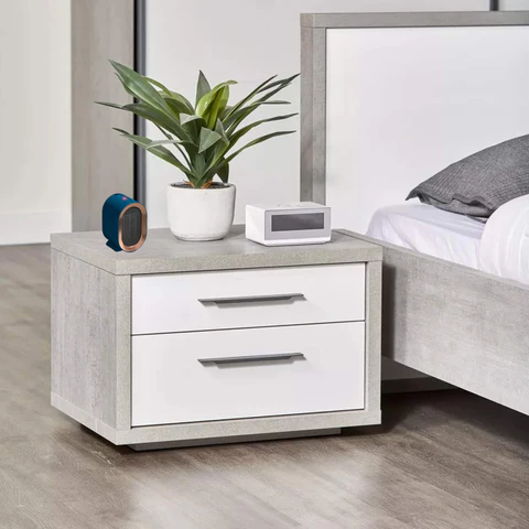 "Compact portable electric heater with energy-efficient ceramic element, ideal for heating small spaces, shown in stylish des