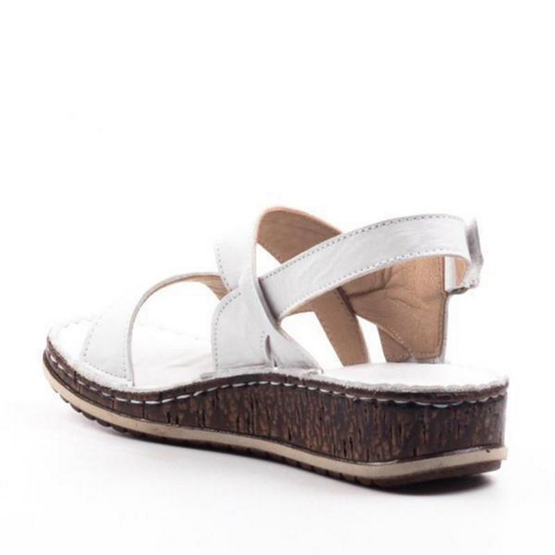 "Elegant women's strappy wedge sandals with open toes, slingback straps, and a cork-look base, perfect for summer style."