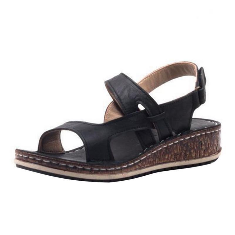 "Elegant women's strappy wedge sandals with open toes, slingback straps, and a cork-look base, perfect for summer style."