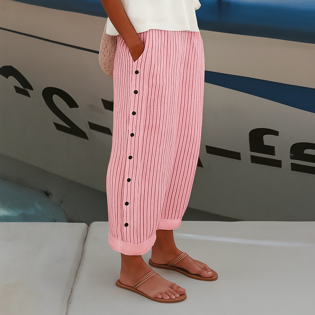 Women's linen blend striped pants, front view; drawstring waist, vertical stripes, ankle-length, side pockets, loose fit.