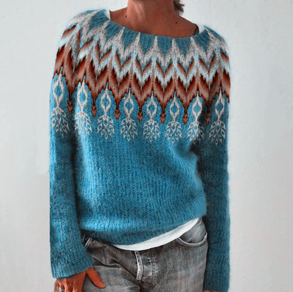 Women's multicolor knit patterned sweater with crew neck, showcasing bold colors and unique design, front view.