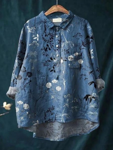 Back view of a women's elegant floral print long sleeve blouse. Chic and comfortable for daily wear.