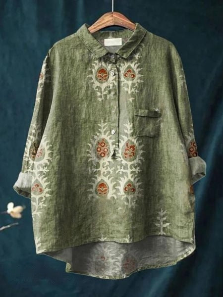 Women's spring/summer floral blouse, styled elegantly. Comfortable long sleeve top for chic fashion.