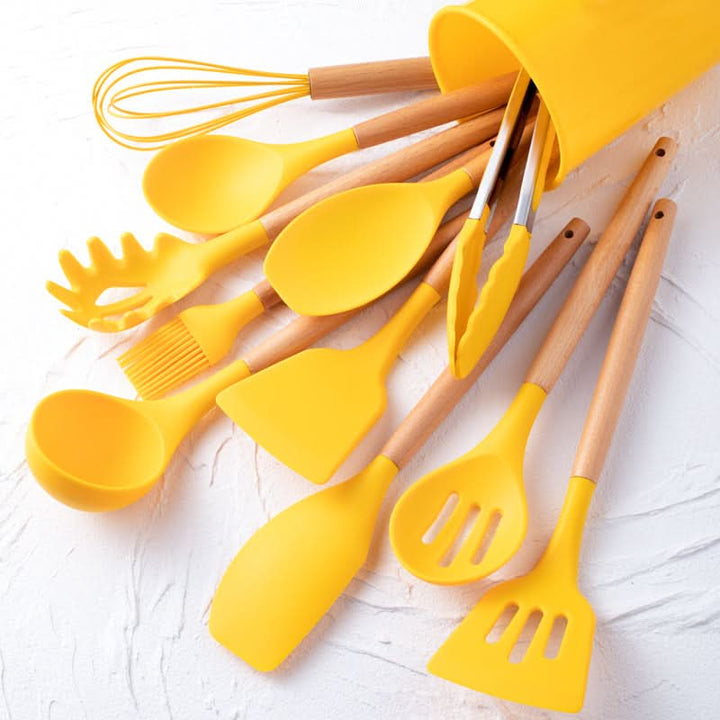 12-piece silicone utensil set, heat resistant kitchen tools with wooden handles. Dishwasher safe.
