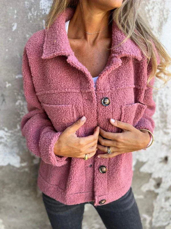 Versatile women's short jacket in a chic style, featuring a modern lapel collar for daily wear.