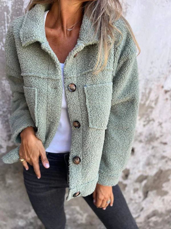 Effortlessly stylish women's lapel collar jacket, a comfortable and elegant piece for any occasion.