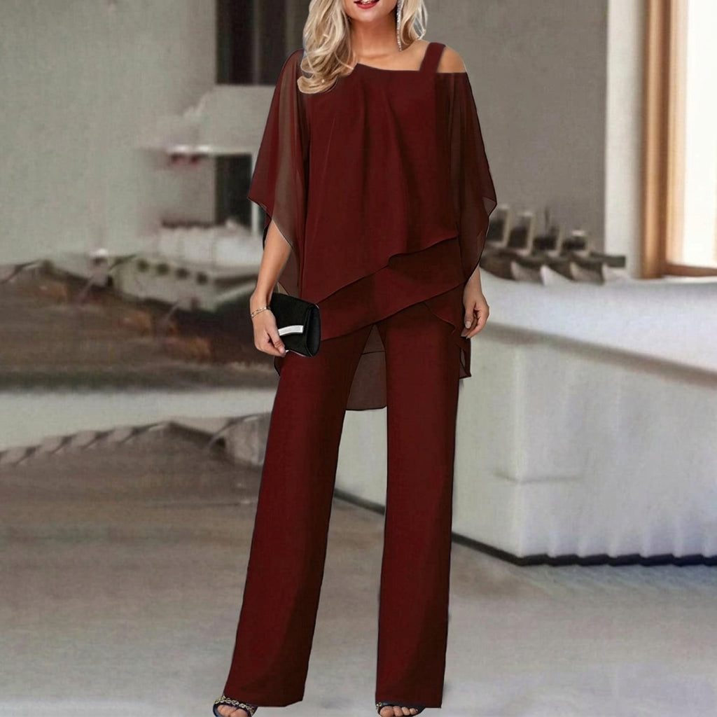 Women's elegant asymmetric top & straight leg pant two-piece set for versatile style.