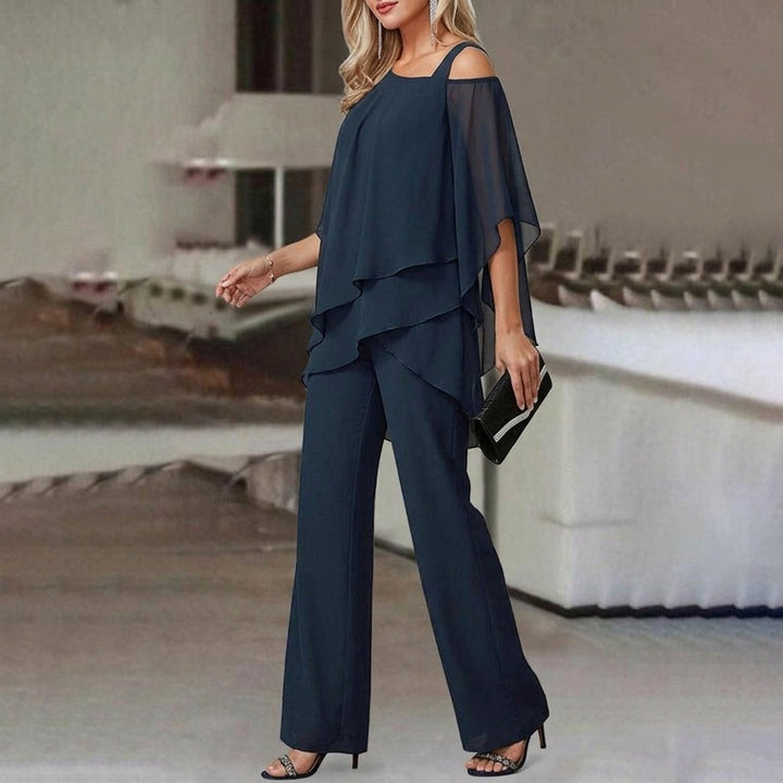 Versatile women's elegant two-piece set: asymmetric top & straight leg pants for chic office or evening wear.