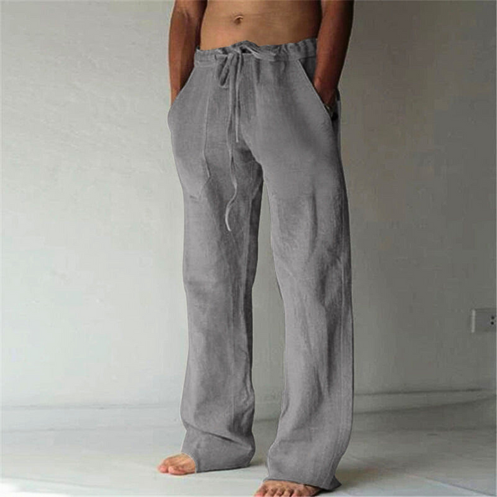 Men's high-waist wide-leg lounge pants with comfortable drawstring. Perfect for relaxed casual wear.