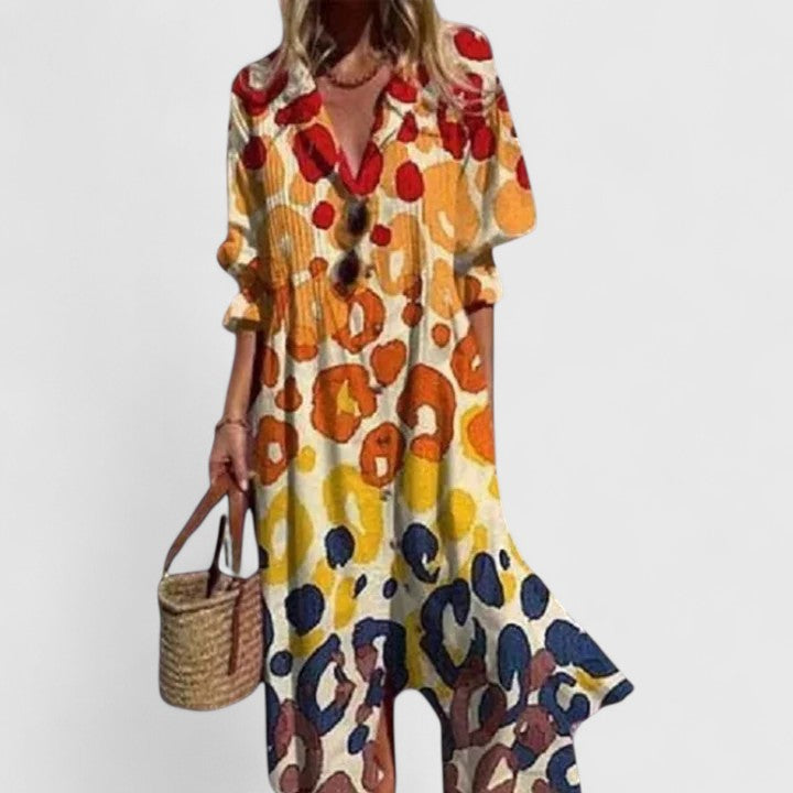 Casual women's long sleeve maxi dress with a vibrant botanical print for a bohemian look.
