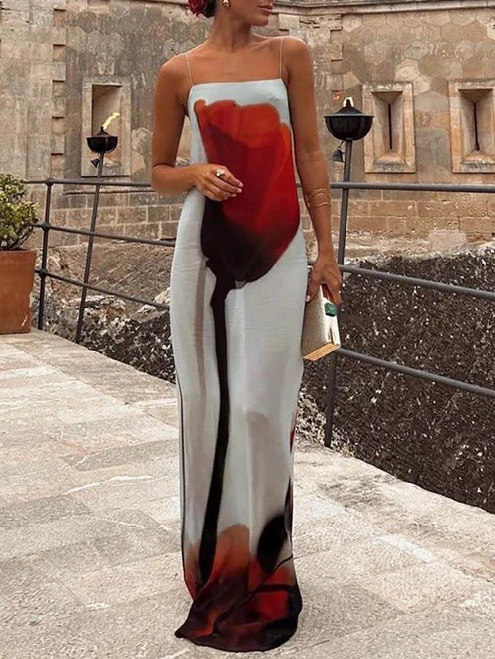 Women's flowing maxi sundress with abstract print, perfect for comfortable summer style.