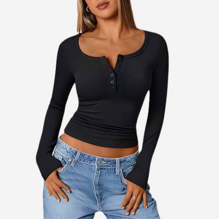 Soft ribbed knit henley top for women, featuring long sleeves and a button-up placket for versatile wear.