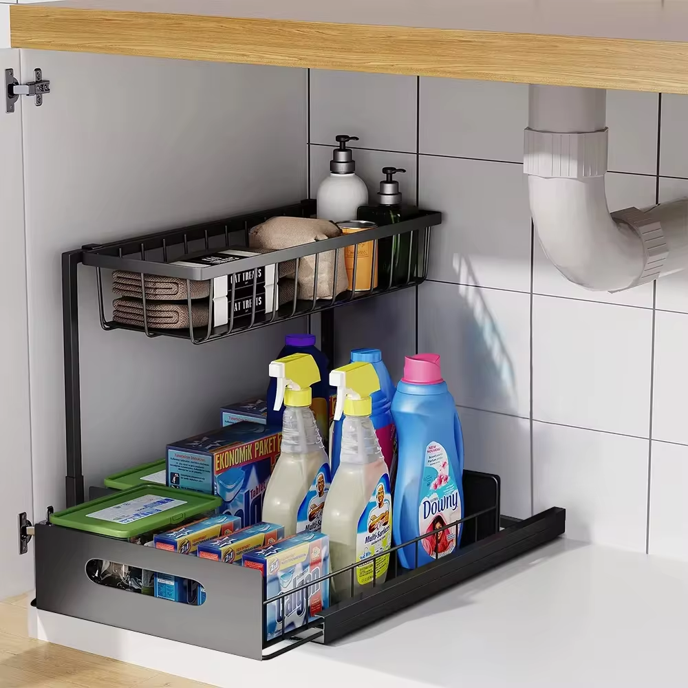 "2 tier slide out under sink organizer with L-shaped design, fits pipes, maximizes space, holds kitchen and bath essentials."