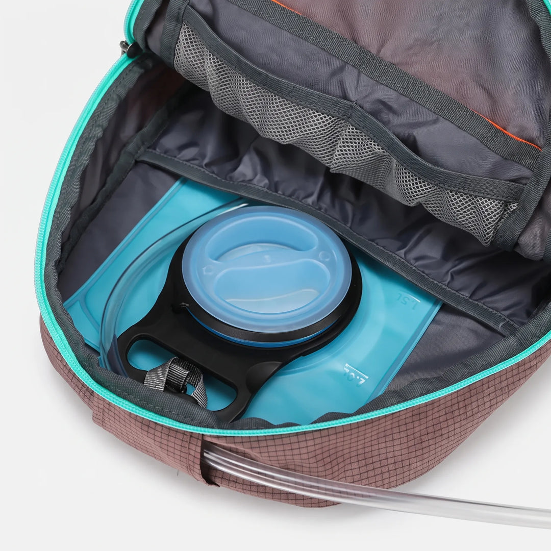 Water-resistant 5.3 Gallon hiking backpack, designed for rugged outdoor use. Unisex and durable for travel.