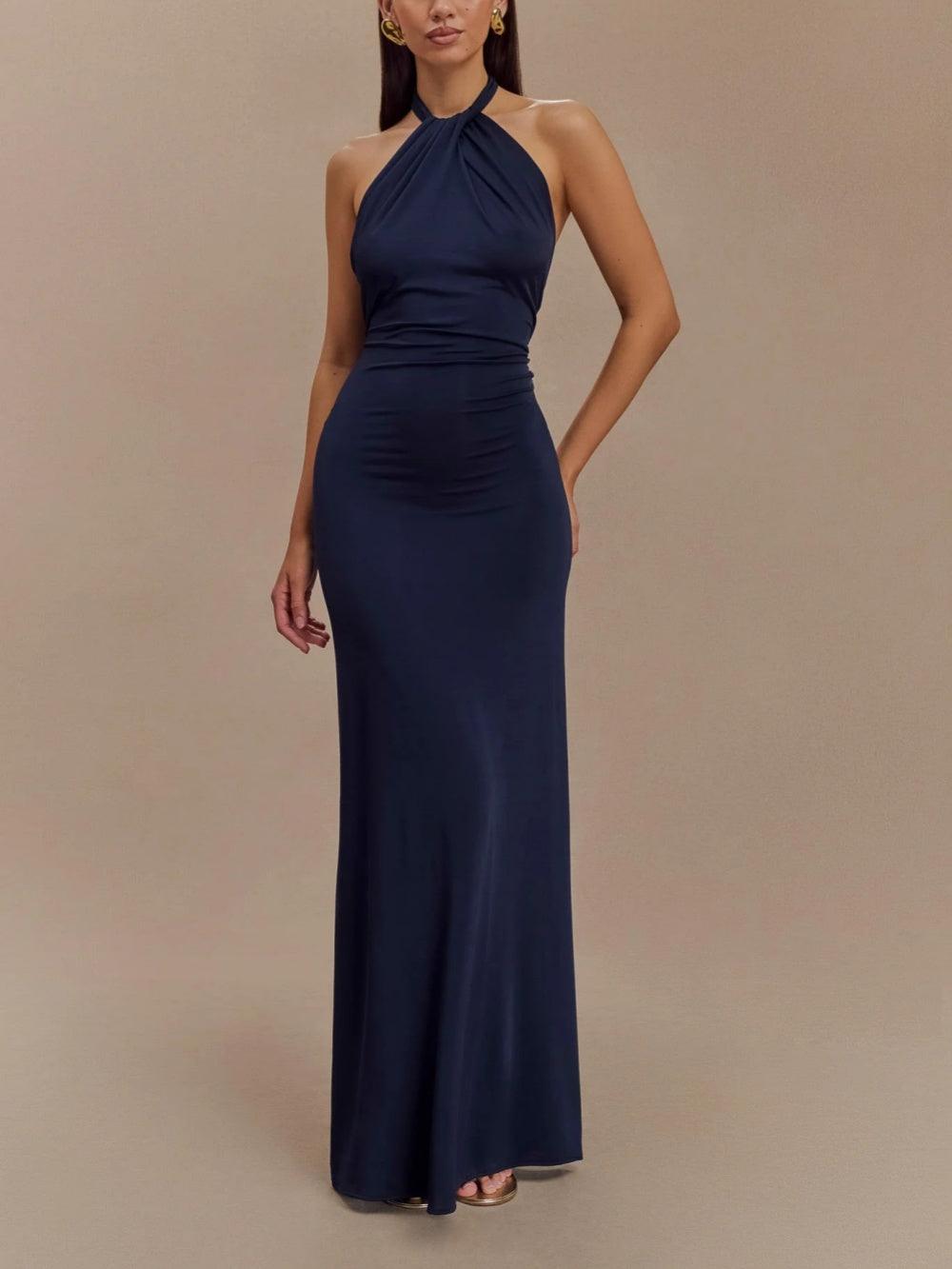 Flowy halter maxi sundress for women, featuring an open back, ideal as a comfortable yet stylish summer beach dress.