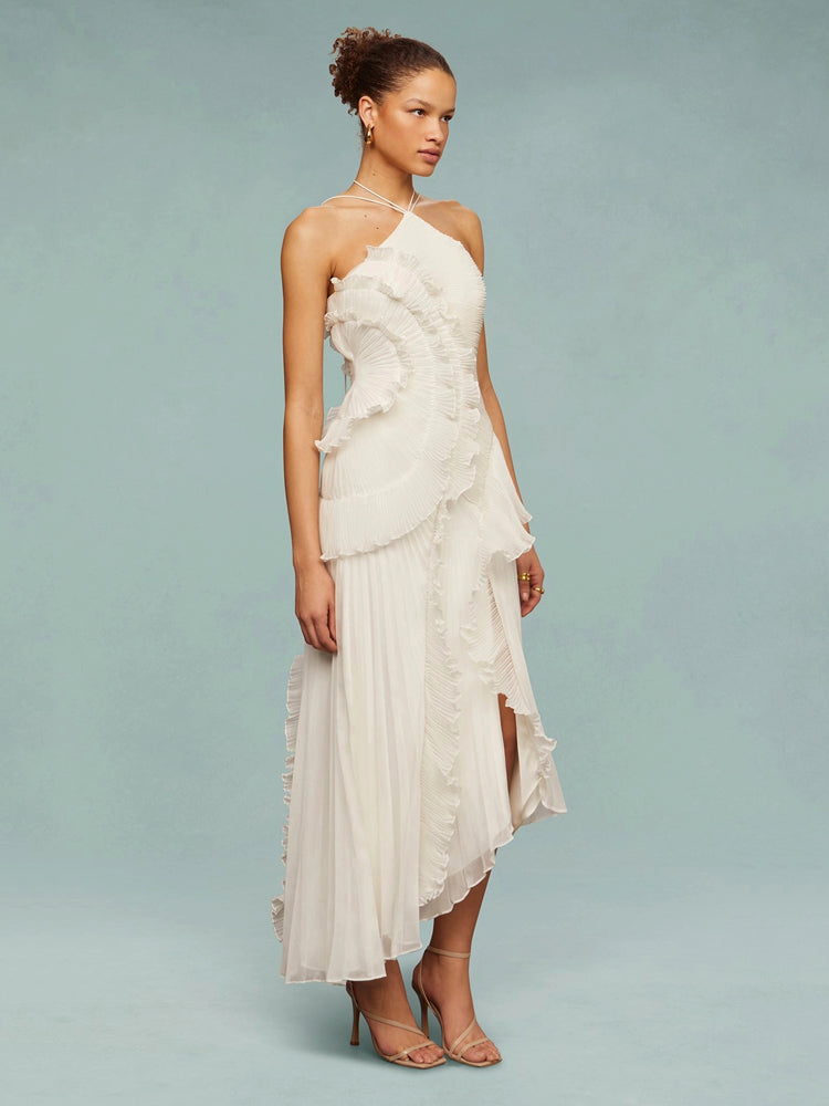 Stunning pleated maxi dress for wedding guests, sleeveless design with unique asymmetric detailing.