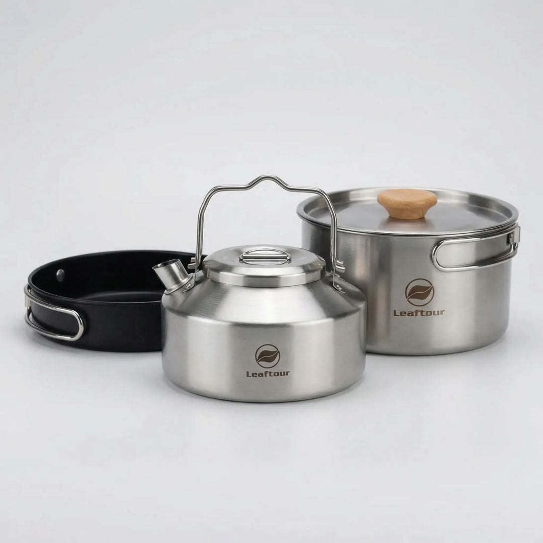 Durable 3-piece nonstick camping cookware set with pot, pan & lid for outdoor backpacking and hiking meals.