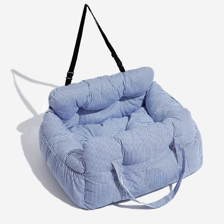 Portable dog booster seat for car, convertible into a pet bed & carrier. Ideal for secure dog travel.