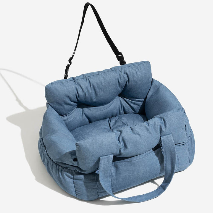 Dog travel car seat transforms into a pet carrier and comfy bed, enhancing outdoor pet adventures.