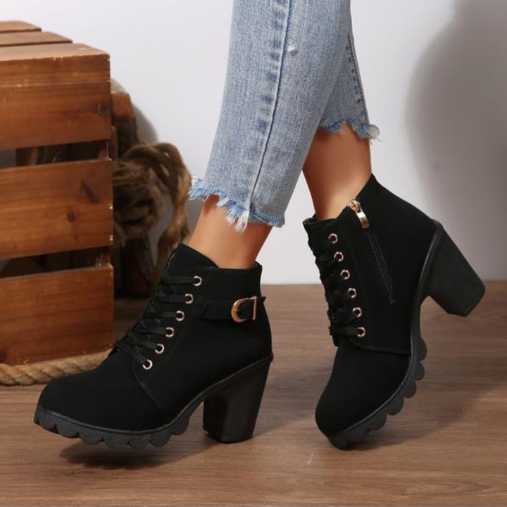 Women's lace-up chunky ankle boots with a comfortable heel, perfect for urban chic style.