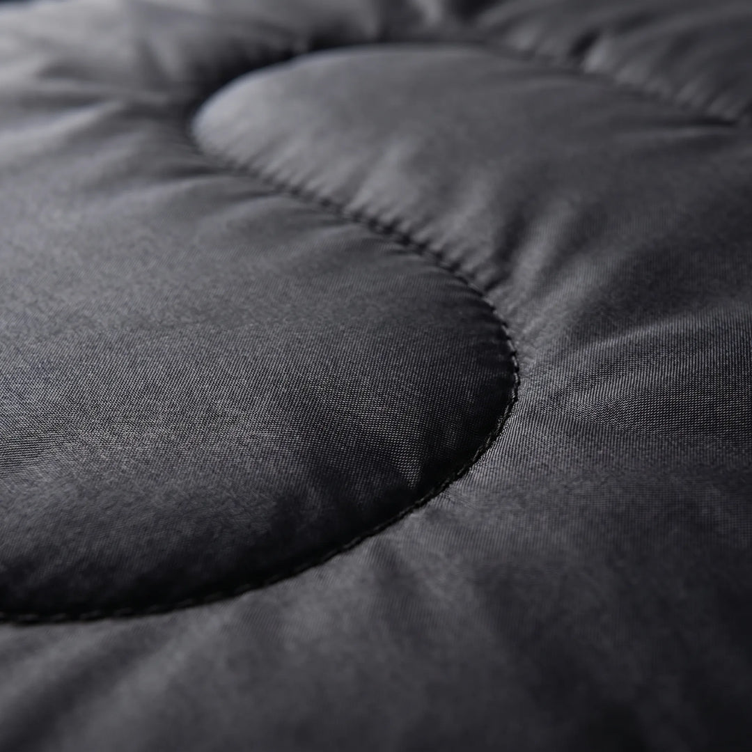 Warm 4-season mummy sleeping bag, designed for winter camping, hiking & outdoor adventures. Durable ripstop material.
