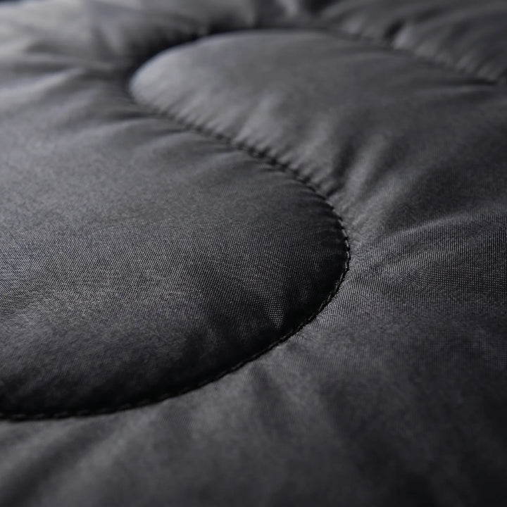 Warm 4-season mummy sleeping bag, designed for winter camping, hiking & outdoor adventures. Durable ripstop material.