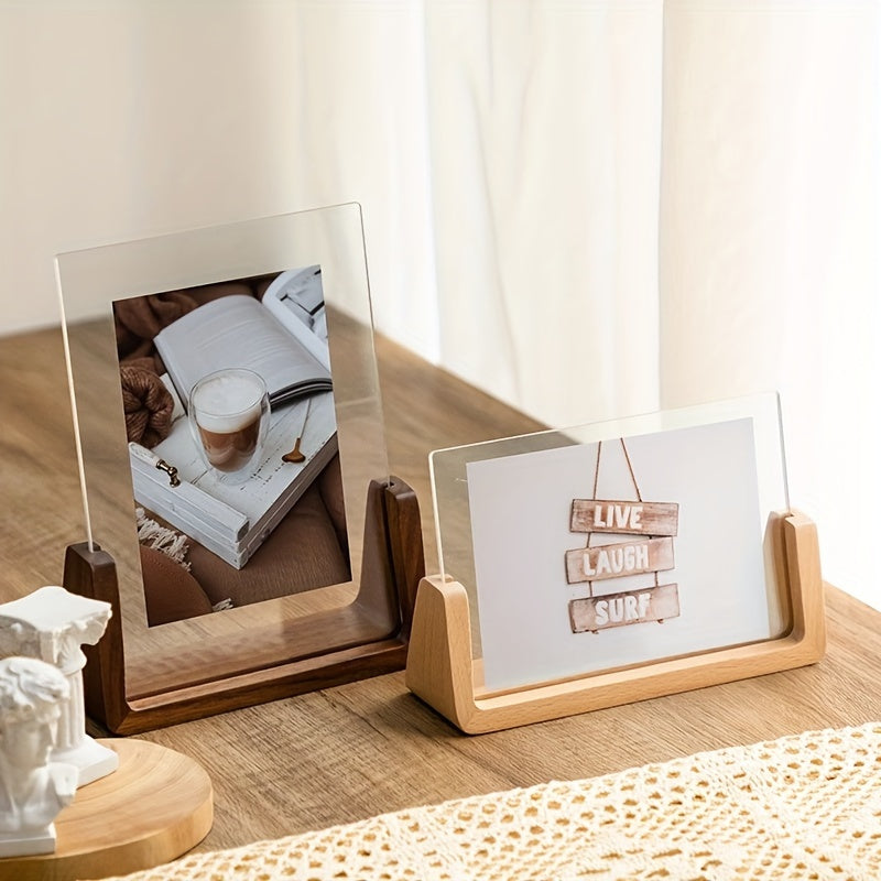 Clear 6-inch acrylic picture frame with a sturdy wood base, ideal for tabletop accent.