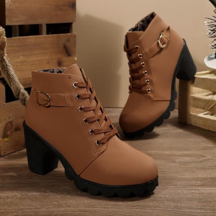 Stylish women's chunky heeled ankle boots, lace-up design for versatile fashion and urban wear.