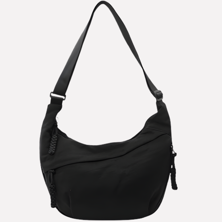 Front view of a women's nylon crescent crossbody bag, ideal for stylish daily organization.