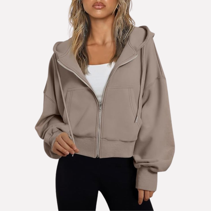 Fashion-forward women's graphic pullover. Cozy long sleeve, crew neck, oversized fit for casual style.