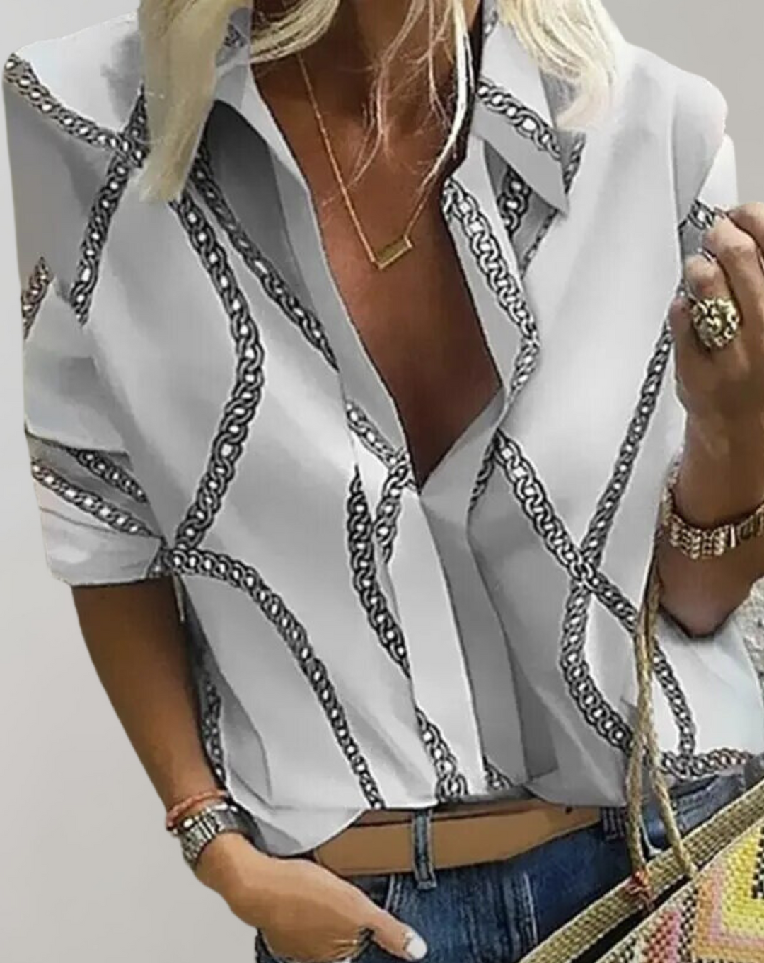 Stylish women's printed blouse featuring an elegant chain pattern, ideal as a statement top for fashion-forward women.