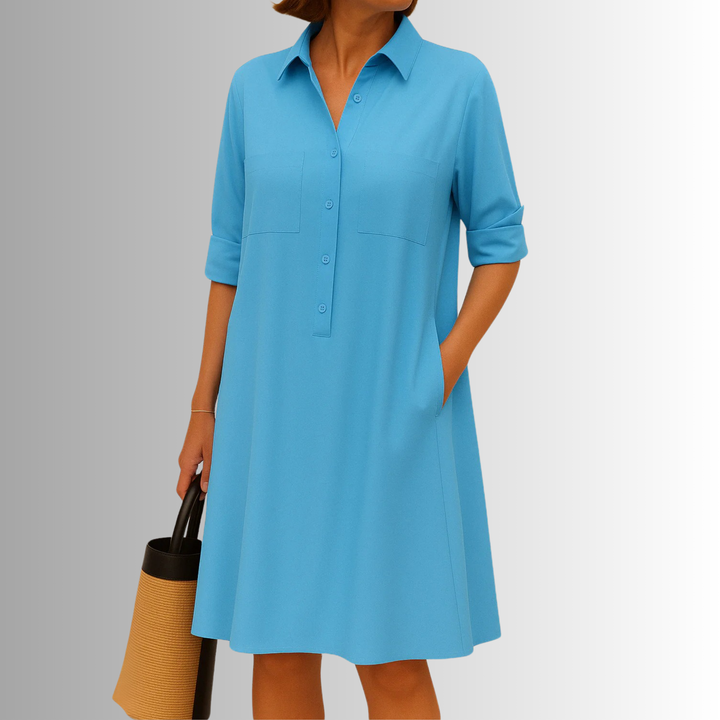 Comfortable women's casual A-line button dress with 3/4 sleeves & pockets, a versatile midi for everyday style.