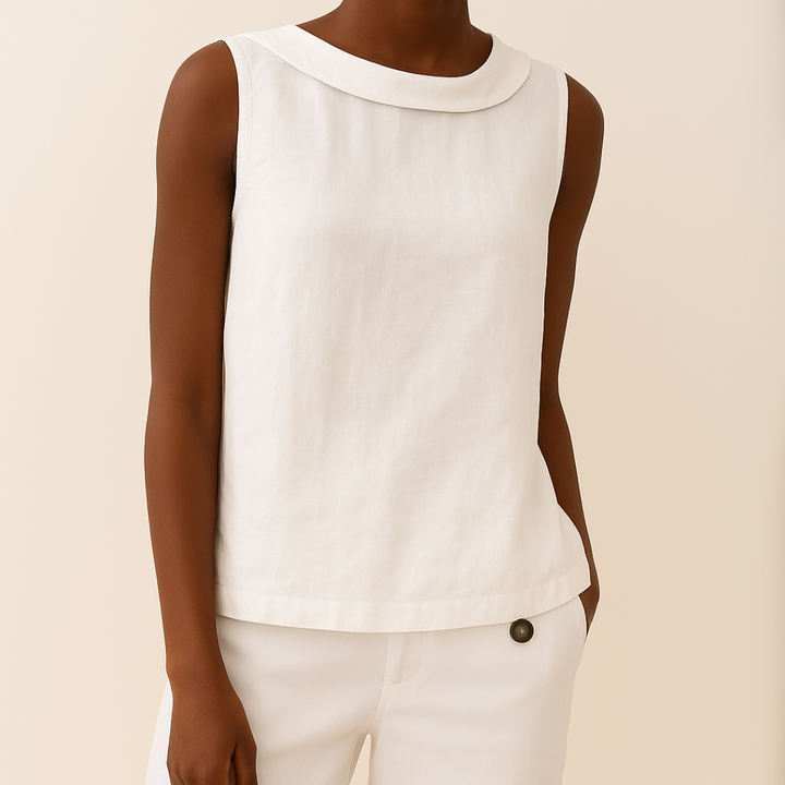 Lightweight women's sleeveless blouse with a classic round neck. Ideal for relaxed summer fashion & comfort.