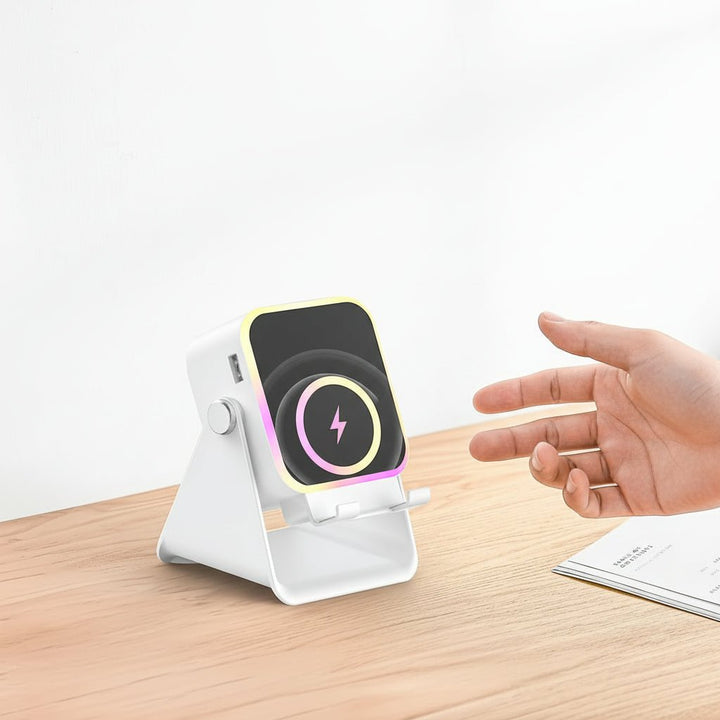 Innovative tech gadget: wireless speaker dock, phone stand, and LED light, enhancing any smartphone experience.