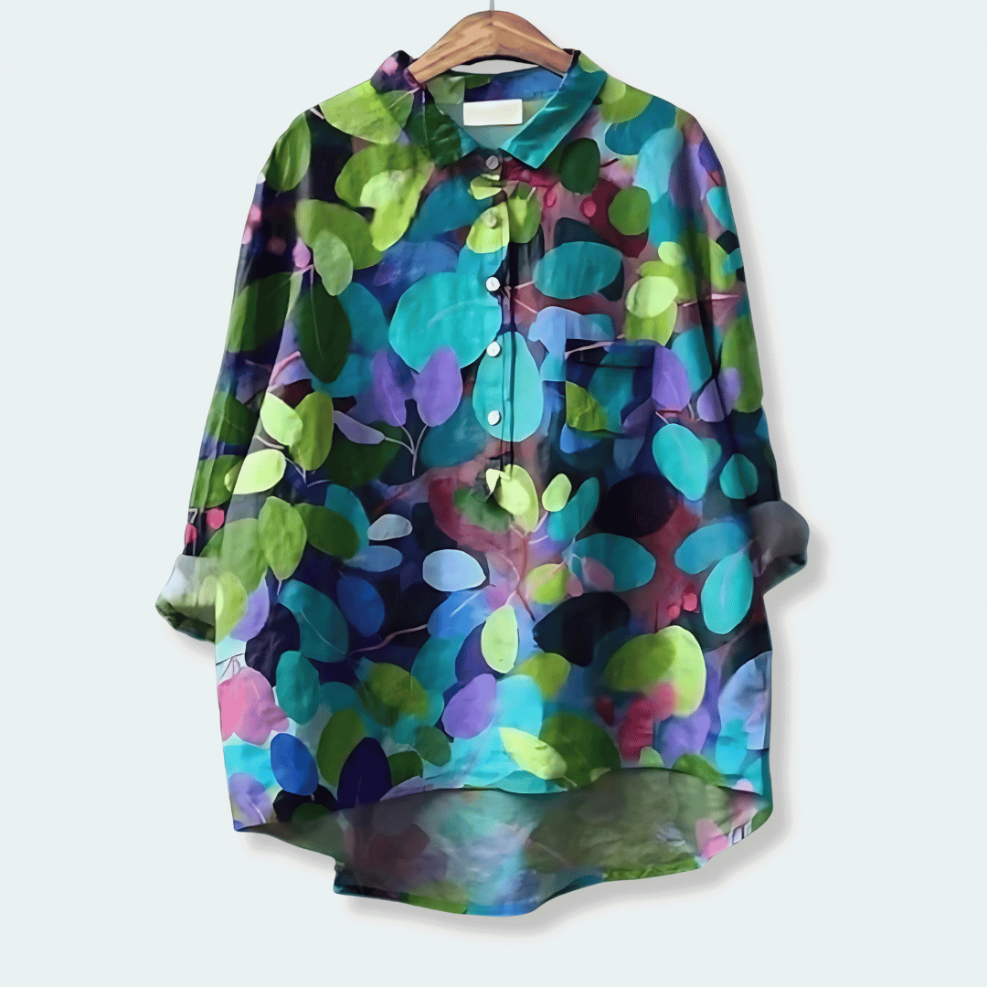 Elegant women's floral button-front long blouse. Loose fit, ideal for office wear & sophisticated casual looks.