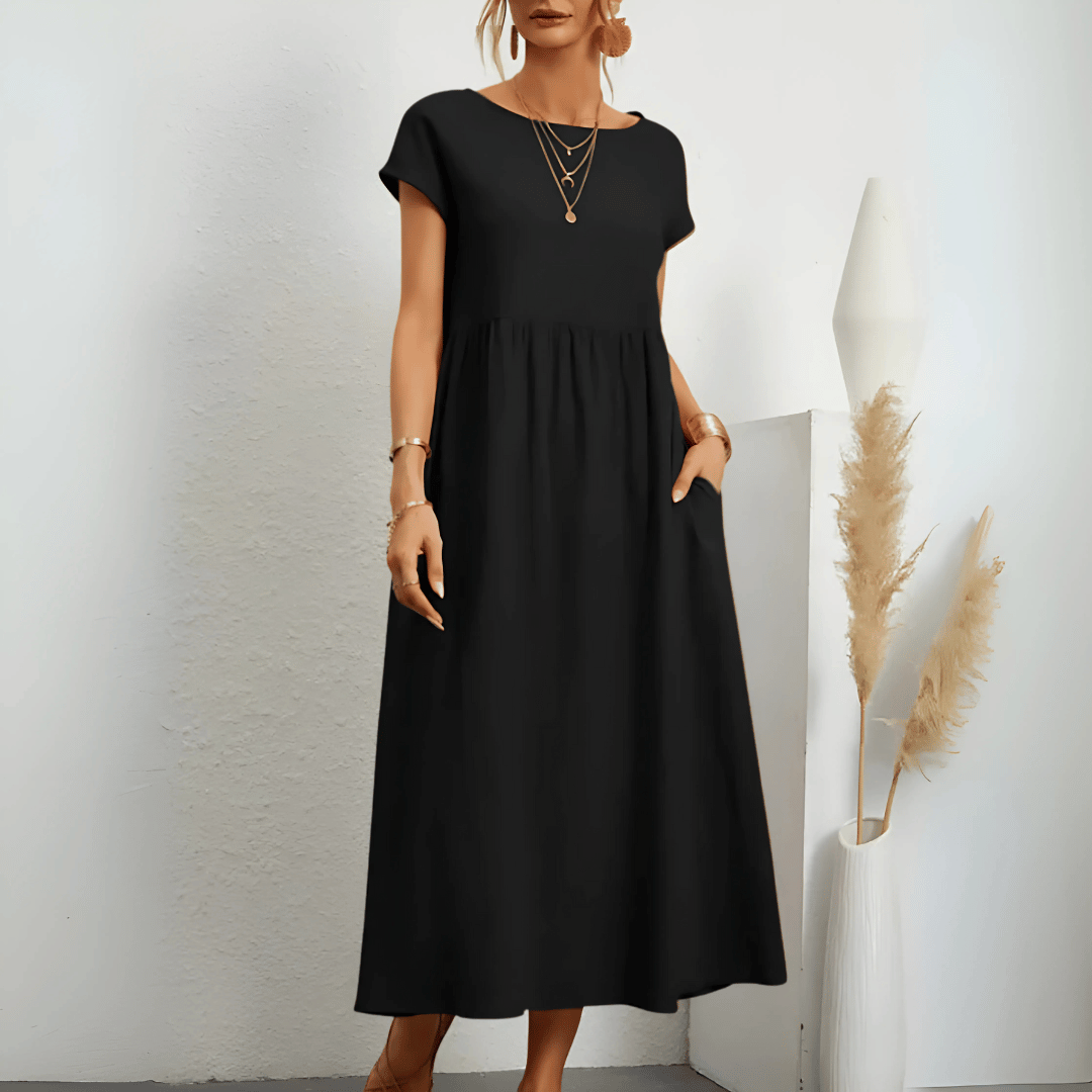 Comfortable women's vintage style flowy maxi dress, a chic pullover with short sleeves for summer fashion.