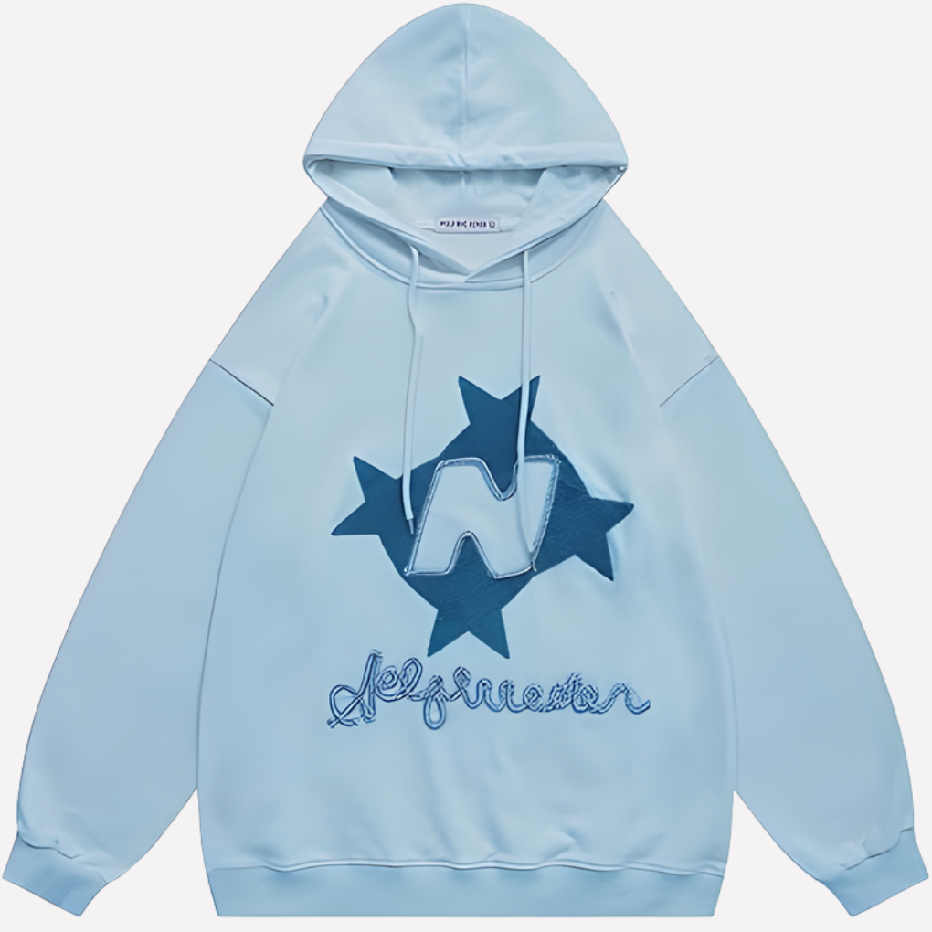 Women's oversized star graphic pullover hoodie. Cozy, relaxed fit long sleeve for casual streetwear.