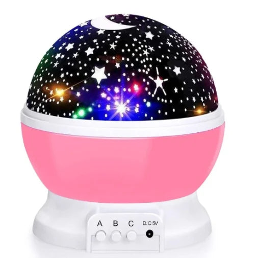 Children enjoying a magical starry night light experience from the LED galaxy projector in their cozy bedroom.