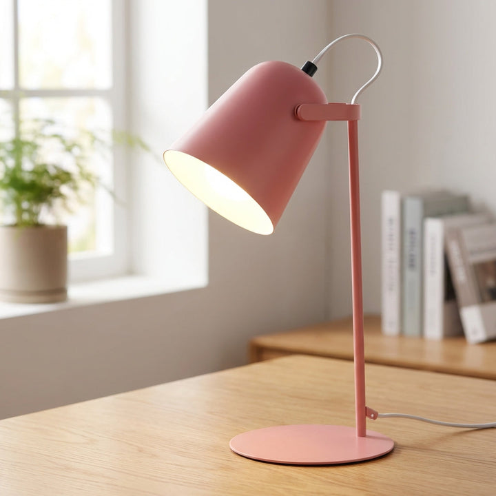 Modern adjustable desk lamp for focused task lighting in home offices & workspaces.