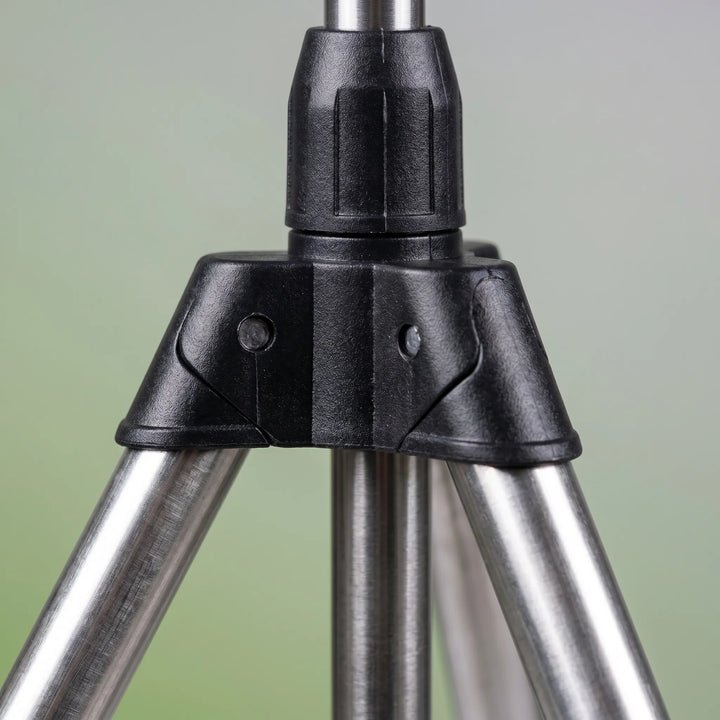 Elevated adjustable tripod sprinkler head with wide coverage for large lawn and garden watering and outdoor cooling.