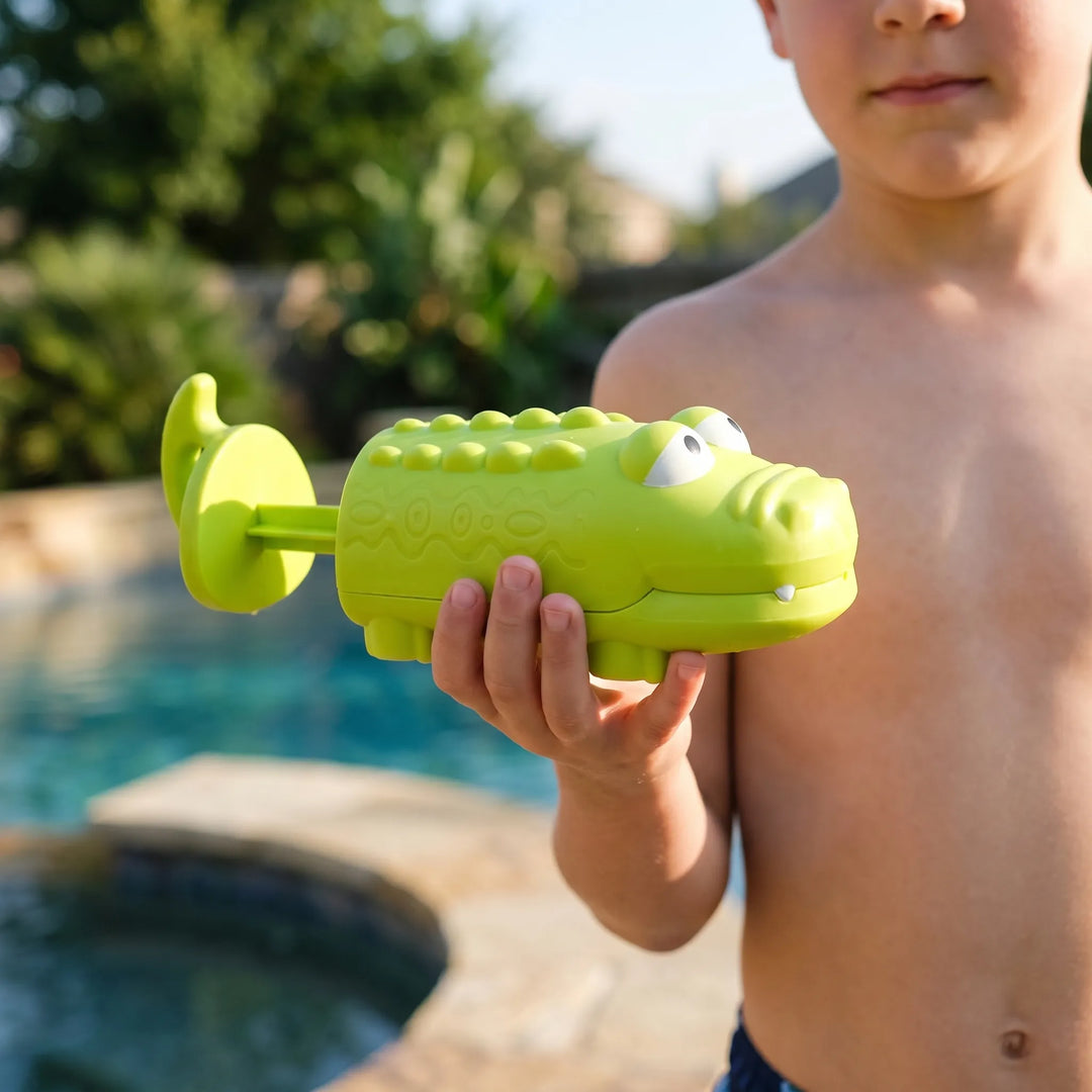 Fun animal squirt toy for children, perfect for summer outdoor water play at the beach or pool.