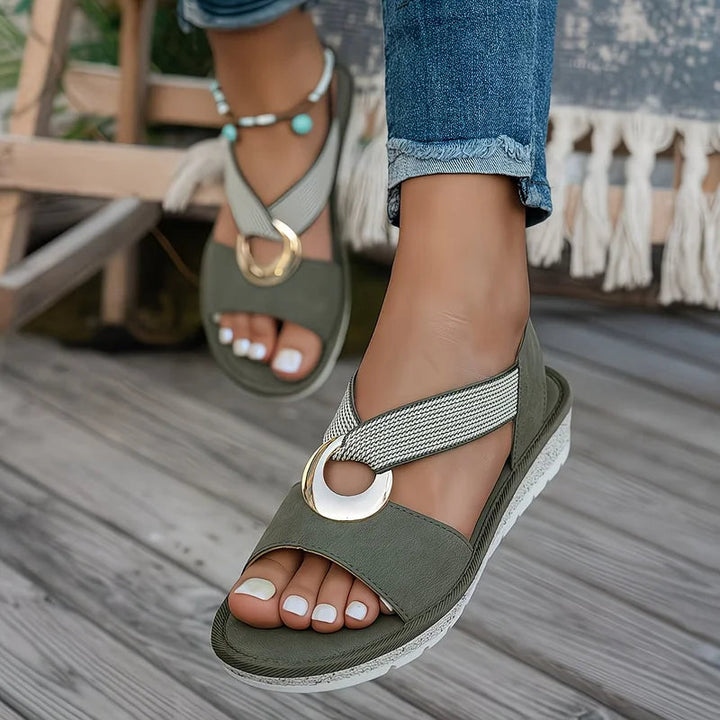 Ergonomic women's orthopedic sandals featuring stretch straps & a modern metallic accent for daily comfort.