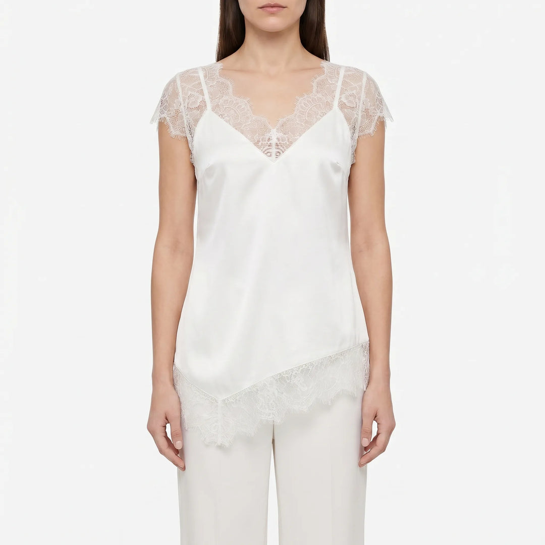 Sophisticated women's sheer asymmetrical top, a fashionable sleeveless blouse perfect for parties & evenings.