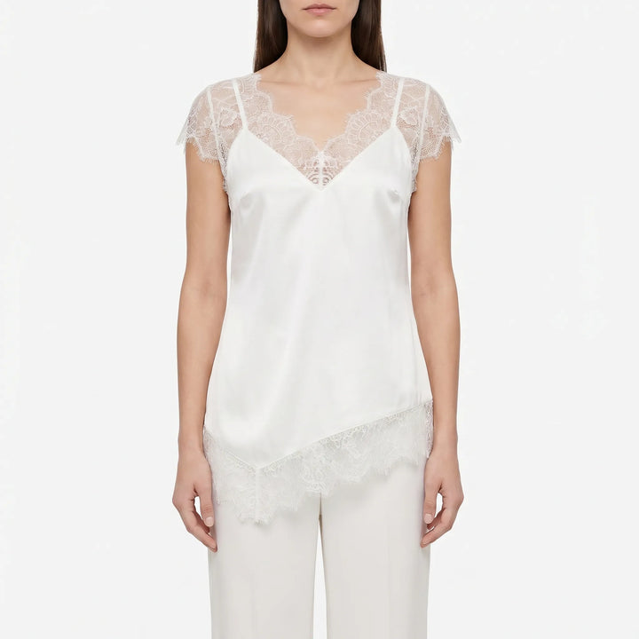 Sophisticated women's sheer asymmetrical top, a fashionable sleeveless blouse perfect for parties & evenings.