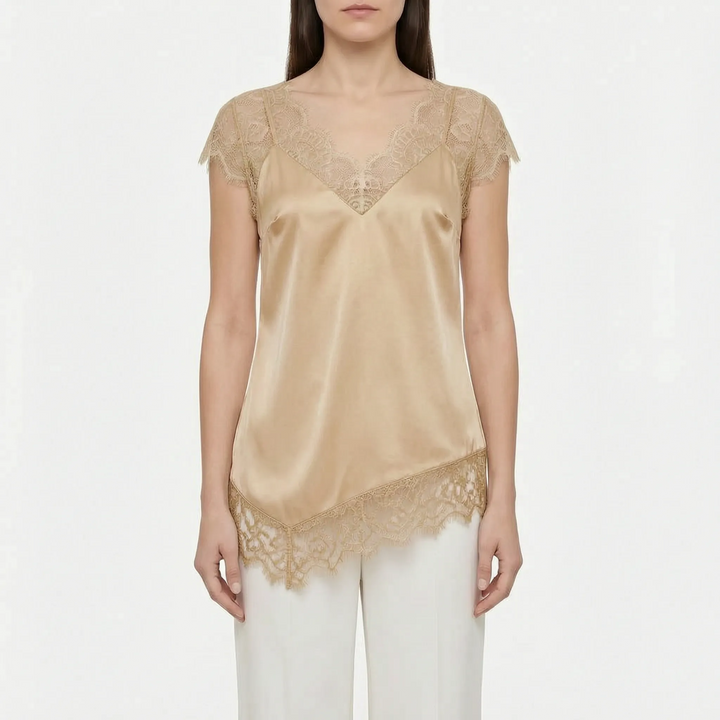 Stylish women's asymmetrical blouse, elegant party top with sheer details & V-back. Fashionable summer wear.