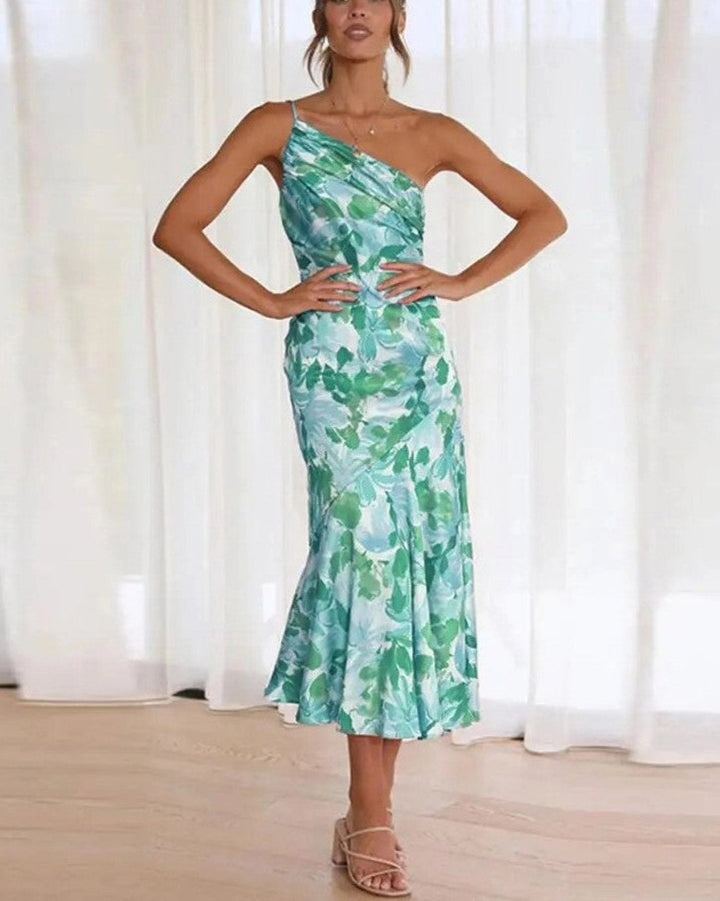 Women's elegant summer floral dress; a sleeveless midi with a unique asymmetric design.
