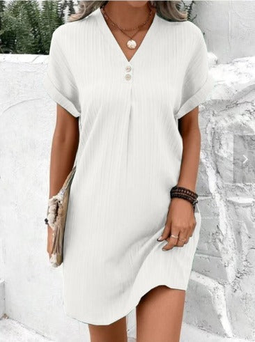 Chic women's V-neck flowy spring dress. Floral print, midi length. Versatile for elegant casual & summer outfits.