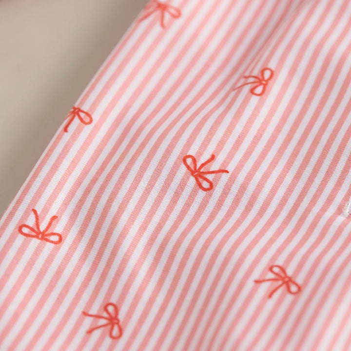 Girls' baby sun hat, part of a rash guard set, offering UPF sun protection for infants & toddlers at the beach or pool.