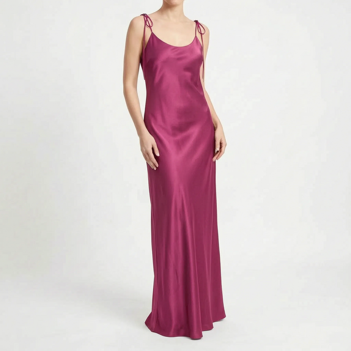 Lightweight women's backless floor-length slip dress, a chic and effortless summer evening style.