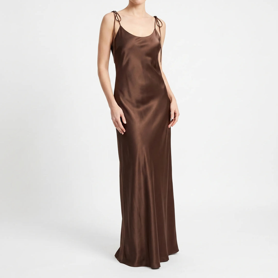 Flowing women's floor-length backless slip dress with a V-neck, offering effortless evening style.